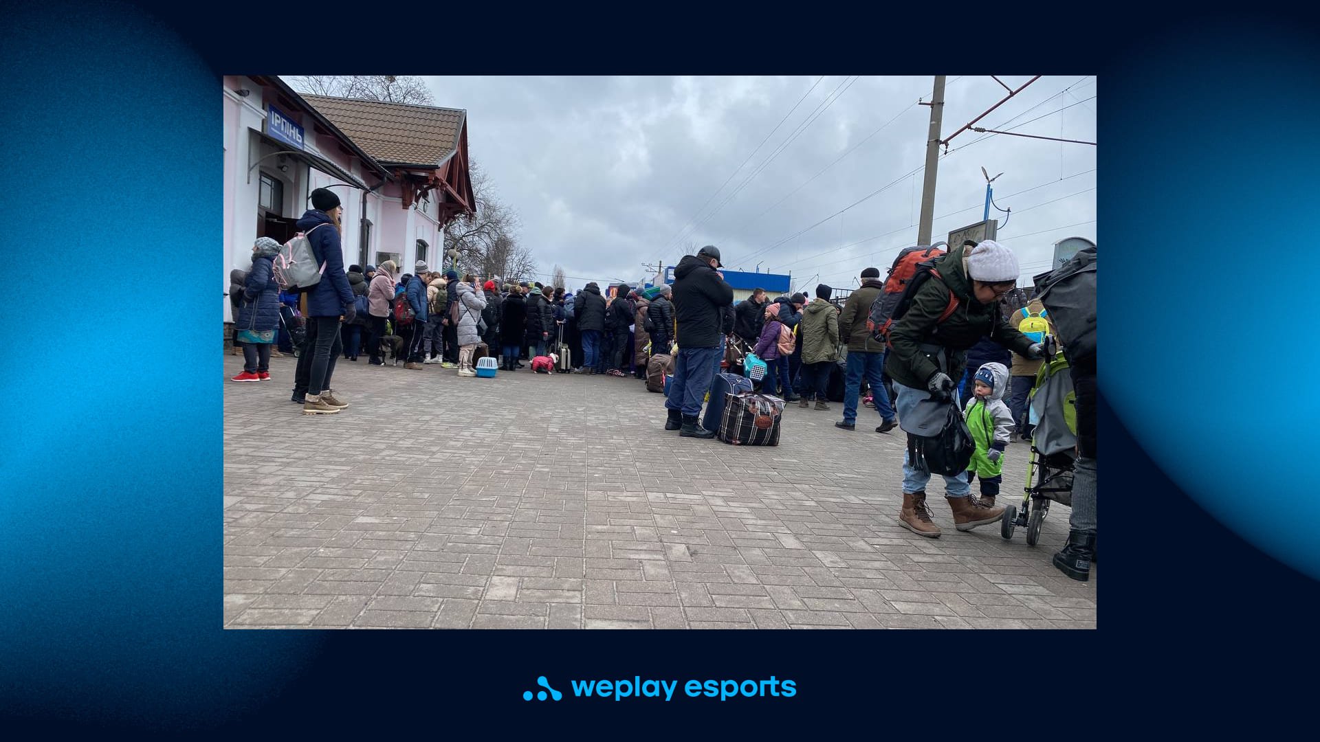 People at the train station during one attempt to evacuate by train / Buildings damaged or destroyed during shelling of Irpin by the occupiers. Credit: WePlay Holding